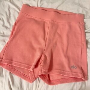 Alo Yoga Coral Pink Ribbed Mini Shorts